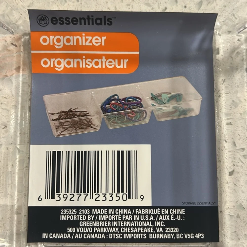 3 plastic organizers by Essentials.  All three are identical. Made in China.